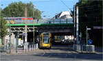 Die Bahnbrücke und die Tram -     Impressionen der Essener Tram im Bereich der Bahnunterführung Steller Straße.