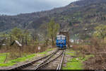 Am 15.04.2023 fährt CFR Călători 64 0950 mit dem Regio 4116 über die Stahlbrücke mit dem Vierschienengleis bei Valea Vișeului, Rumänien und konnte hier mit einem