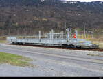 BLS - Autotransportwagen Sdt 50 85 98 04 054-3 abgestellt im Bahnhofsareal in Interlaken Ost am 09.03.2024 ..