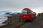   Die Heizöl befeuerte BRB 12 (Kanton Bern) steht am 29.09.2012 mit ihrem Zug an der Bergstation Rothorn Kulm (2.244m ü.