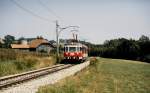 ET 24.104 der Lokalbahn Lambach - Haag ist im Juli 1992 zwischen Bachmanning und Gaspoltshofen unterwegs