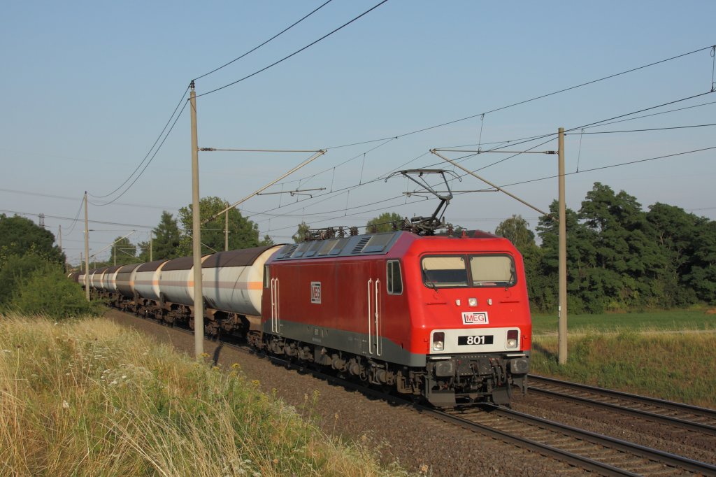 156 001-0 (MEG 801) mit einem Ganzzug Kesselwagen auf der Fahrt in Richtung Braunschweig. Fotografiert am 16.07.2010 gegen 19.30 Uhr in Magdeburg Diesdorf. 