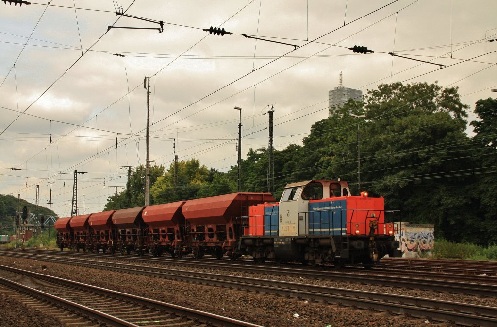 214 001-0 der  Nordbayrischen Eisenbahn  mit Steinzug in Kln West am 10.07.13.