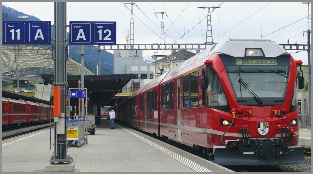 ABe 8/12 3504 als Vorspann vor RE 1261 nach Scuol-Tarasp in Chur. (09.05.2010)