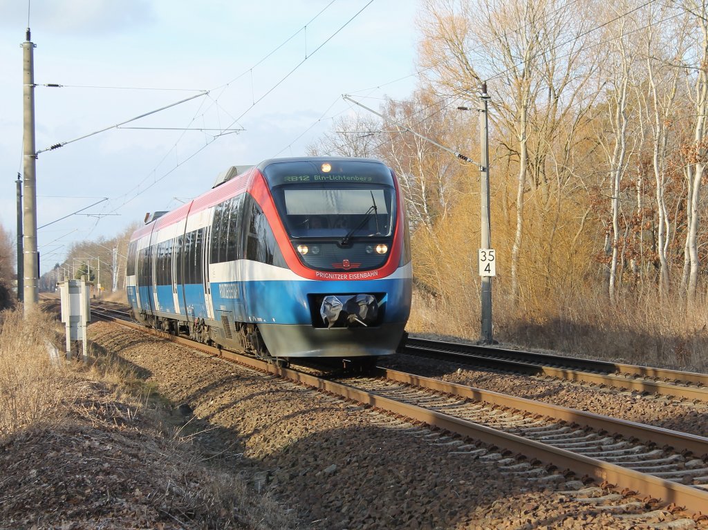 Bombardier Talent 643 auf der RB 12 nach Berlin-Lichtenberg, hier am 20.02.2012 am Kilometer 35,4 der Nordbahn in Nassenheide.