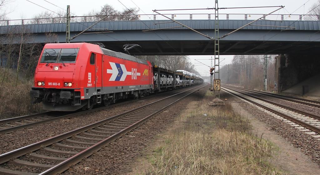 Die 185 603-8 hat wohl einen neuen ARS-Altmann Aufdruck bekommen. So gesehen am 17.03.2012 mit Autotransportwagen in Fahrtrichtung Seelze. Aufgenommen in Dedensen-Gmmer.