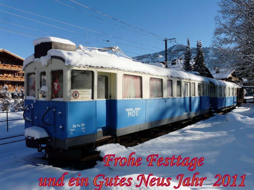 MOS - Triebwagen De 4/4  26 mit Personenwagen C 61 und Gterwagen Gk 529 abgestellt in Saanen am 04.12.2010