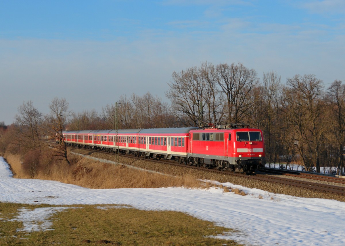 111 005 mit einem RE am 21.02.2012 bei Hilperting. 