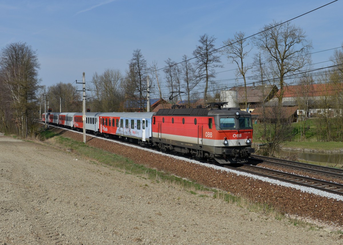 1144 286 mit einem REX nach Linz am 22.03.2014 bei Kimpling.