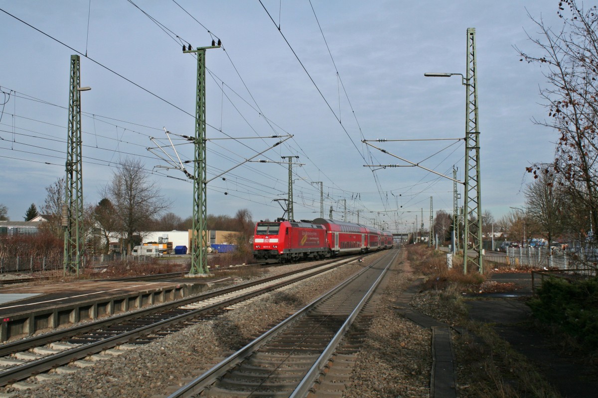 146 111-0 verlsst am Mittag des 25.01.14 mit einer RB von Neuenburg (Baden) nach Freiburg (im Breisgau) Hbf den Bahnhof Mllheim (Baden), hier bei der Ausfahrt aus Gleis 5.