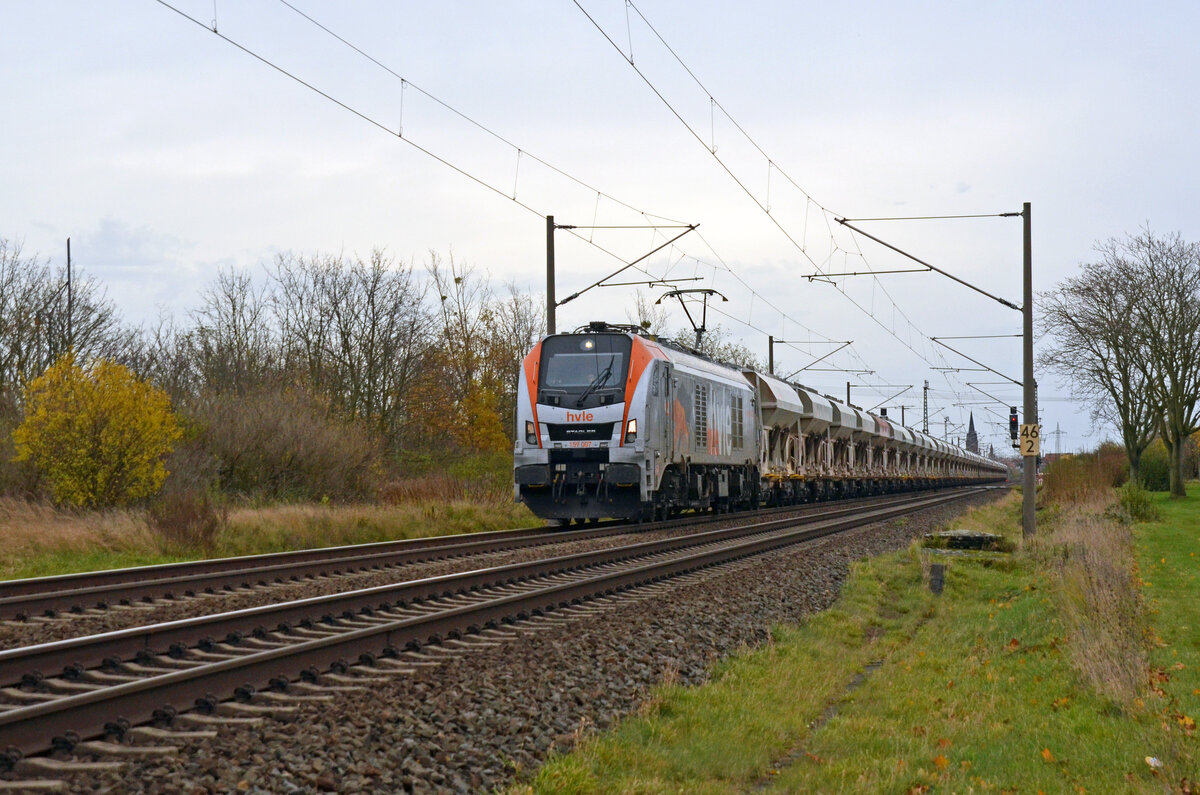 159 007 der hvle führte am 24.11.24 einen Schüttgutzug durch Greppin Richtung Dessau.