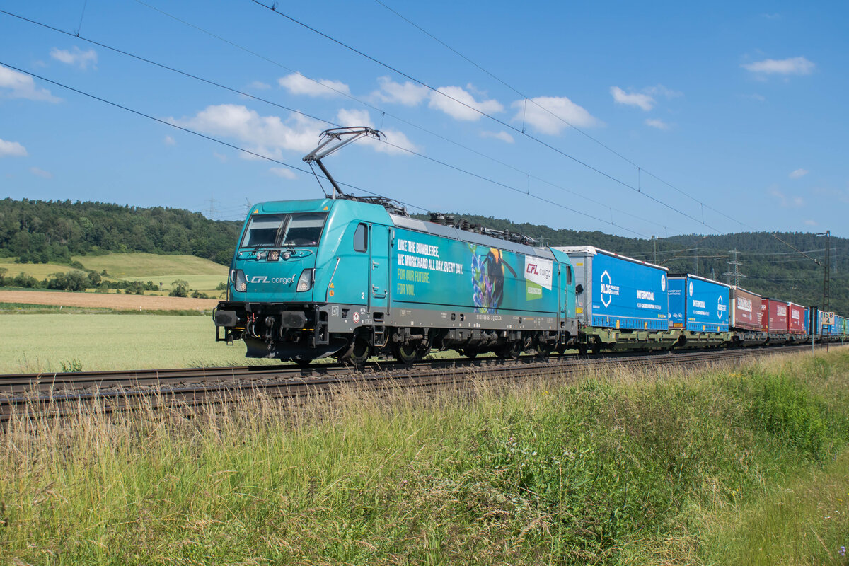 188 067-3 mit einem Aufliegerzug bei Reilos am 25.06.2024.