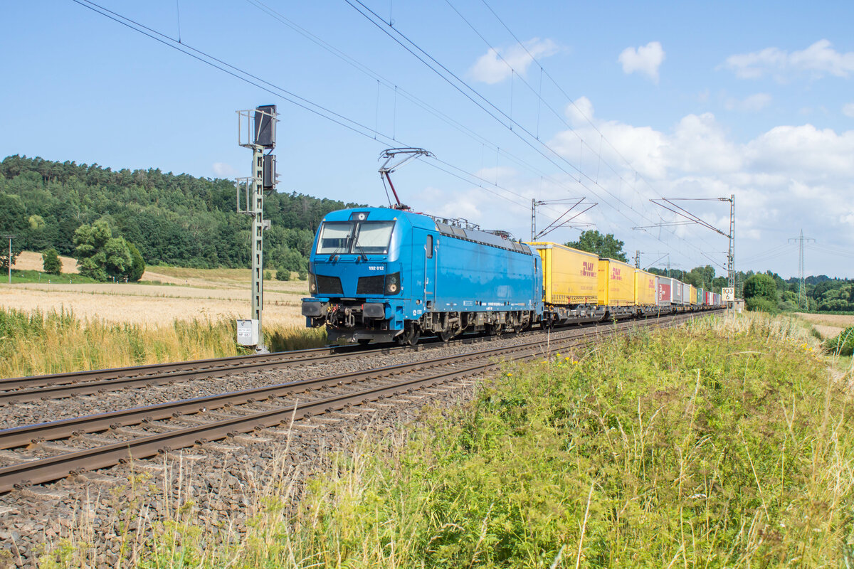 192 012-3 gesehen mit einen Aufliegerzug am 21.07.2021 bei Kerzell.