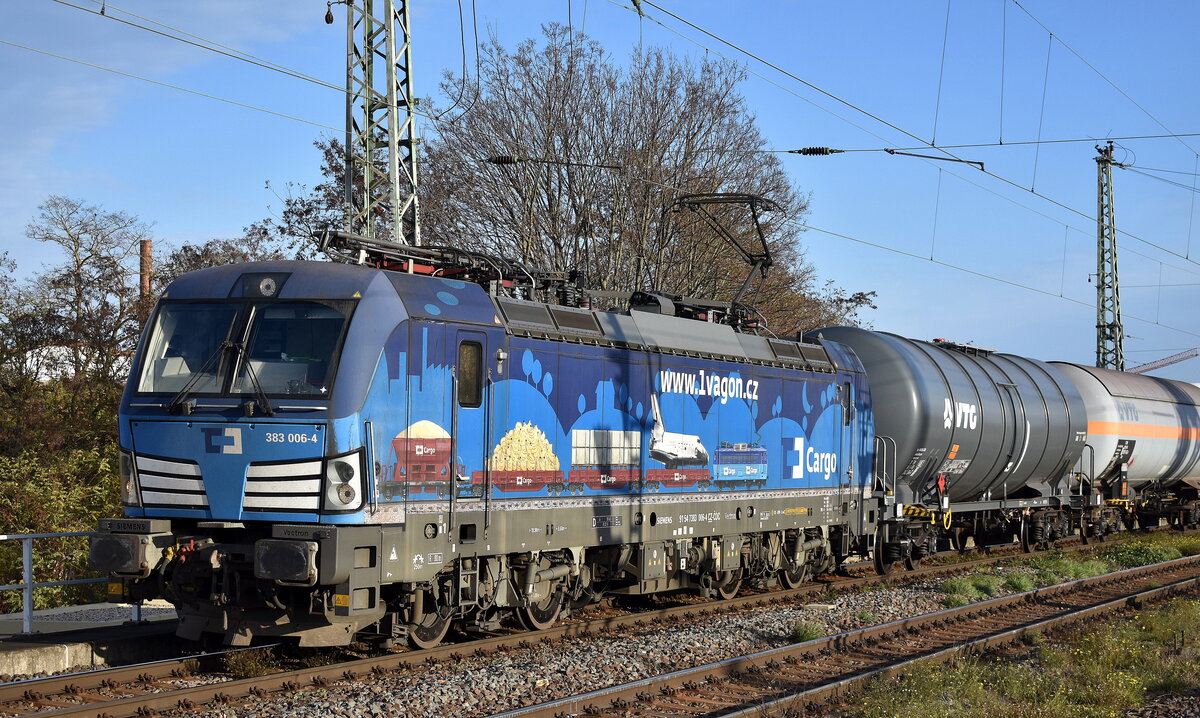 ČD Cargo a.s., Praha [CZ] mit ihrer  383 006-4  [NVR-Nummer: 91 54 7383 006-4 CZ-CDC] und einem gemischten Güterzug (zum Teil belgische Güterwagen) am 26.11.24 Höhe Bahnhof Magdeburg Neustadt.