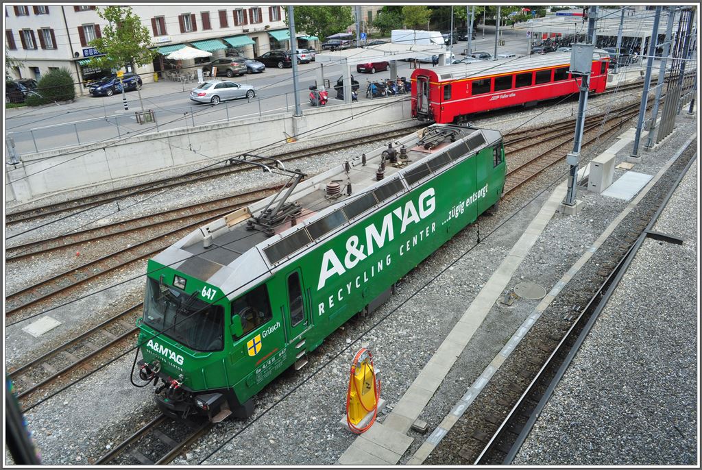 Auch die RhB hat jetzt eine  Grne . Die Ge 4/4 iii 647  Grsch  wirbt fr A&M Recycling AG in Untervaz-Trimmis, einem grossen Gterkunden mit Dreischienenanschlussgleis. (10.09.2013)