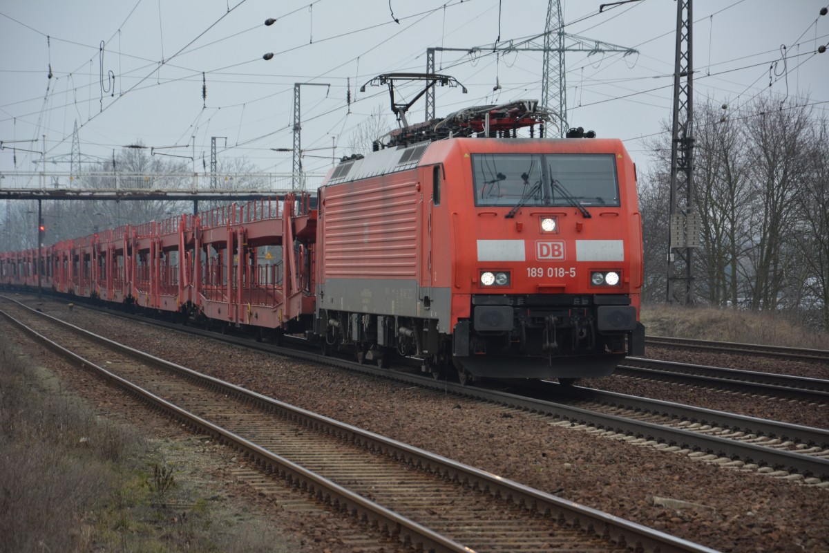 Die 189 018-5 zieht am 12.02.2015 einen Güterzug Richtung Genshagen. Aufgenommen bei der Durchfahrt Bahnhof Saarmund.
