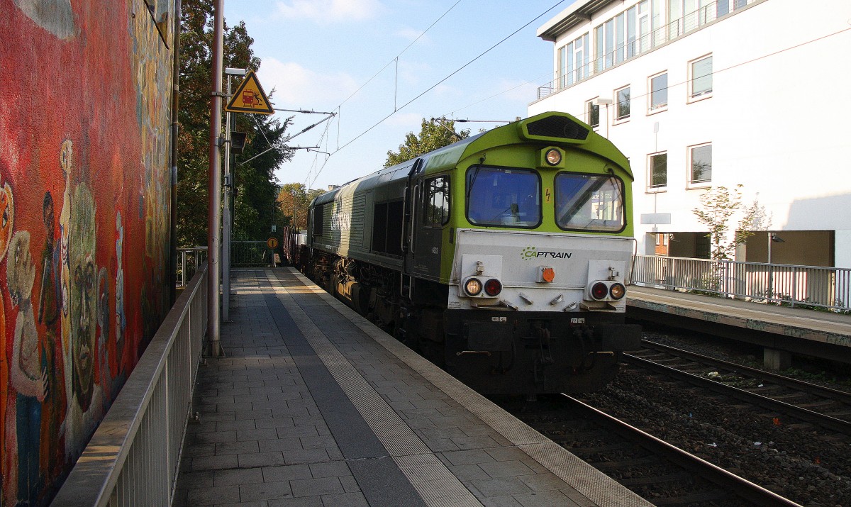 Die Class 66 6603 von Captrain kommt als Umleiter durch Aachen-Schanz aus Richtung Aachen-West mit einem Aluminiumzug aus Dunkerque(F)Kinkempois(B) nach Nievenheim bei Dormagen und fährt in Richtung Aachen-Hbf,Köln. 
Bei schöner Abendsonne am Abend vom 12.9.2014.