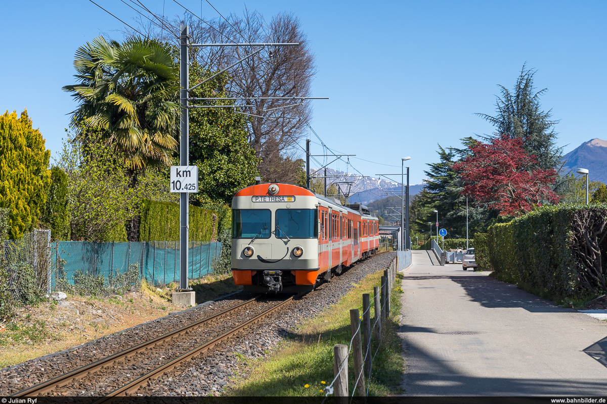 FLP Mandarinli Be 4/12 25  Ceresio  am 6. April 2021 zwischen Magliaso und Caslano.