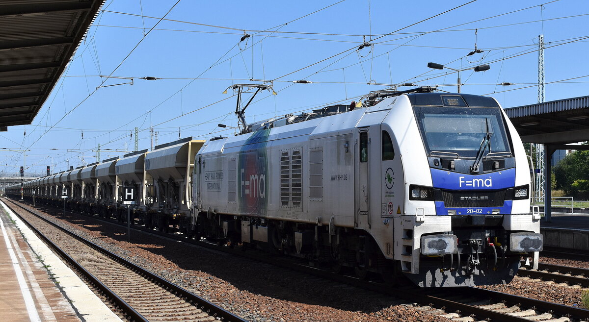 Heavy Haul Power International GmbH, Erfurt [D] mit der Eurodual Lok  20-02  [NVR-Nummer: 90 80 2159 202-1 D-ELP] und einem Ganzzug Schüttgutwagen am 29.08.24 Höhe Bahnhof Schönefeld b Berlin.