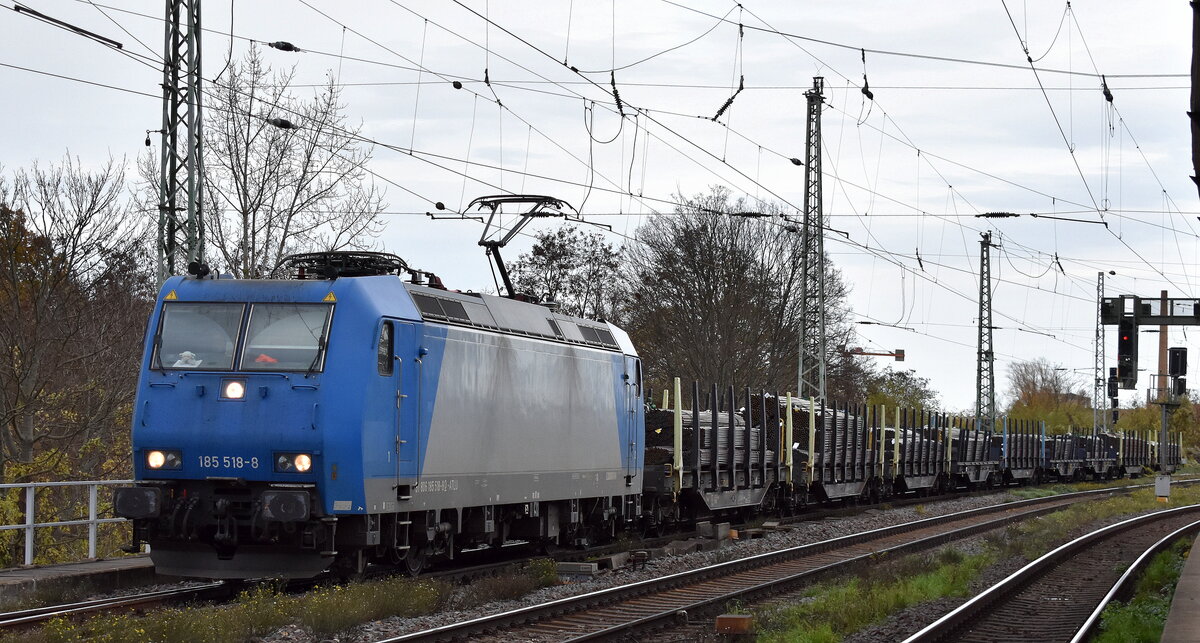 Möglicherweise aktuell Captrain Deutschland CargoWest GmbH mit der ATLU Lok  185 518-8  [NVR-Nummer: 91 80 6185 518-8 D-ATLU] und dem Captrain Stahlzug am 25.11.24 Höhe Bahnhof Magdeburg-Neustadt.