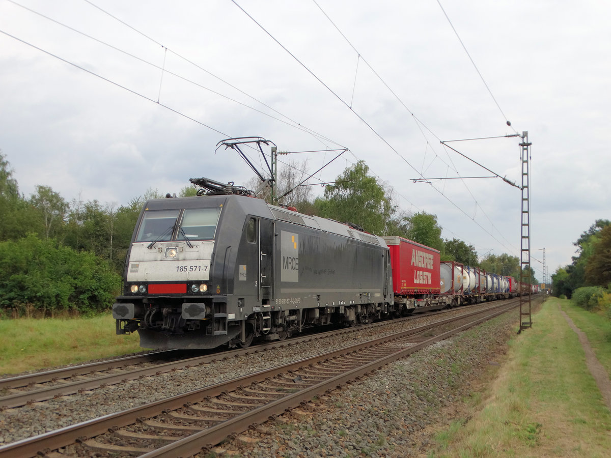 MRCE/Dispolok 185 571-7 mit KLV am 20.09.16 bei Hanau West. Wenn in 5 Jahren der Bau der Nordmainischen S-Bahn beginnt dann wird diese schöne Fotostelle wegfallen 