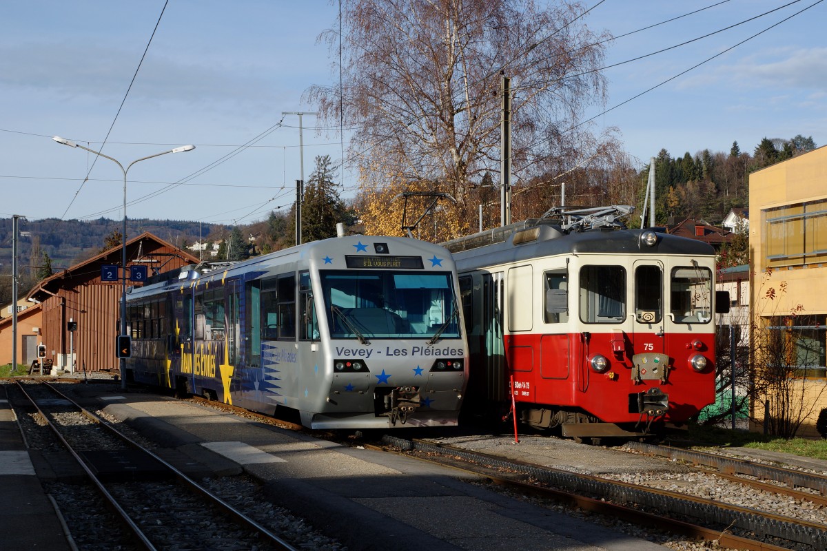 MVR/CEV: Am 11. Dezember 2015 wurde der neue ABeh 2/6 7501 (2015) anlässlich einer  sehr eindrücklichen Feier mit Musik, Ansprachen, vielen Luftballons und Böllerschüssen bei herrlichem Wetter in St-Légier eingeweiht und auf den Namen St-Légier getauft. Zusammentreffen von zwei Fahrzeugen der selben Generation im Originalzustand und im Zustand nach der Modernisierung (Beh 2/4 71, 1970/2002 und BDeh 2/4 75 (1983).
Foto: Walter Ruetsch