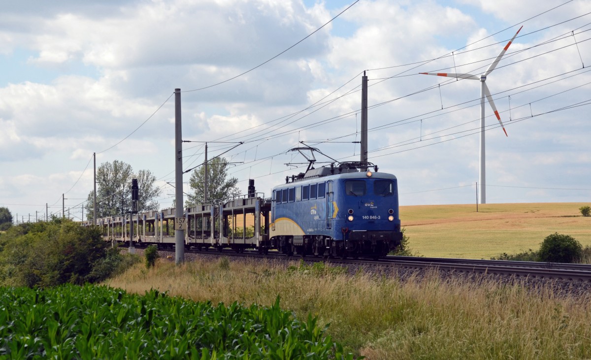 Nachschub in Form leerer Autotransportwagen für den BLG-Standort Falkenberg schleppte 140 848 der EVB am 10.07.15 durch Wellen Richtung Magdeburg.