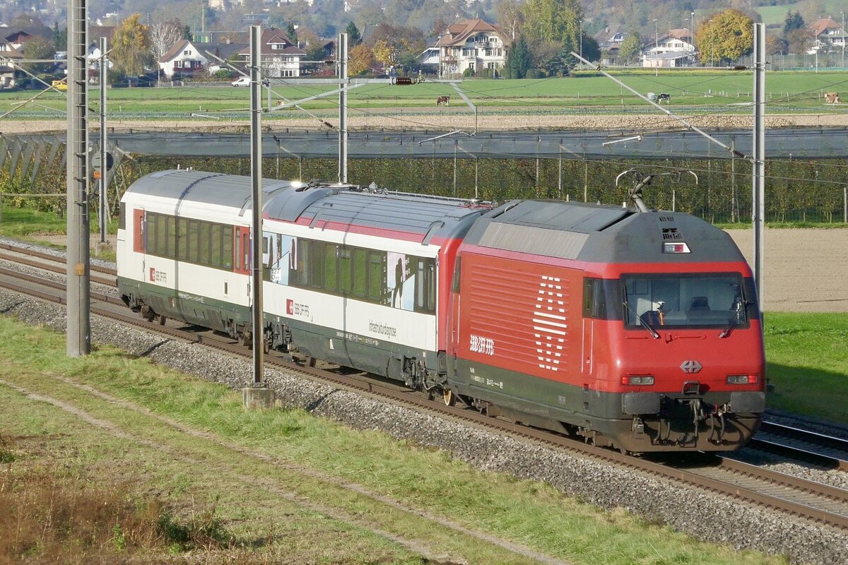 Nachschuss auf die schiebende Re 460 072  Reuss  mit dem Infrastrukturdiagnose Wagen am 11.11.24 zwischen Wichtrach und Kiesen.