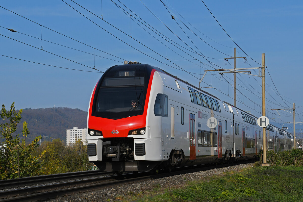 RABe 512 019-6 KISS fährt am 05.11.2024 Richtung Bahnhof Pratteln.