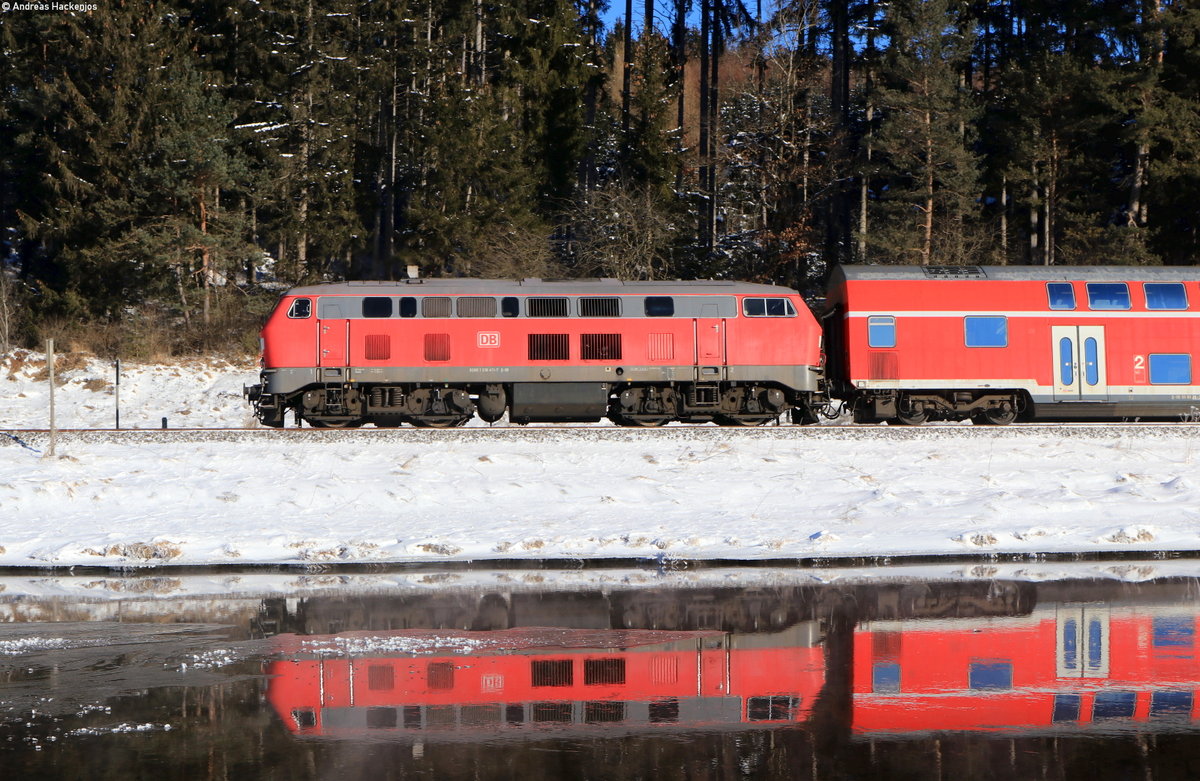 RE 3893 (Oberstdorf-München Hbf) mit Schublok 218 411-7 bei Ruderatshofen 14.2.21