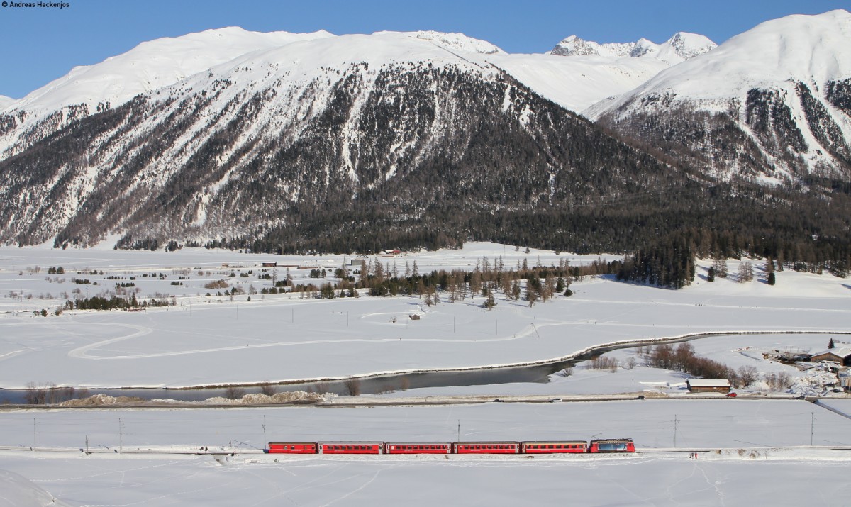 Rhb 617  RE Power  mit dem RE 1343 (Landquart-St.Moritz) bei Celerina 8.3.14