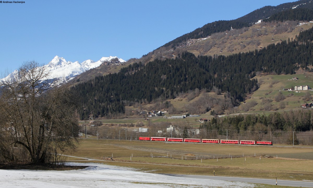 Rhb 704 mit dem RE 1241 (Disentis/Muster-Scuol-Tarasp) bei Castrisch 9.3.14