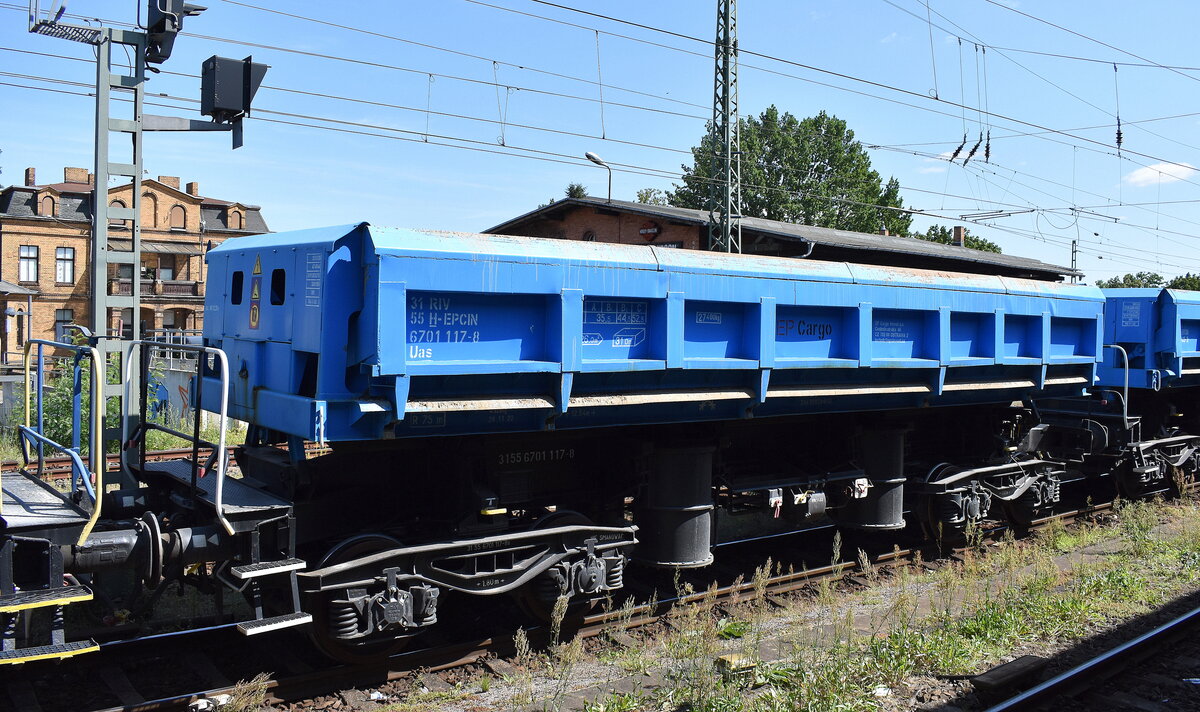 Ungarischer Drehgestell-Schüttgutkippwagen vom tschechischen Einsteller EP Cargo Invest a.s mit der Nr. 31 RIV 55 H-EPCIN 6701 117-8 Uas in einem Schotterzug am 29.07.24 Höhe Bahnhof Königs Wusterhausen. Wagengattung müsste noch in Fas umgezeichnet werden!!