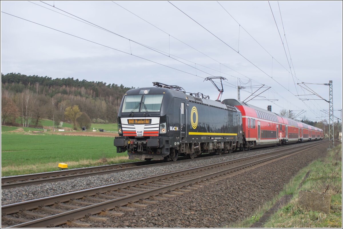 X4E -606 (193 606-1) ist am 26.03.2024 in Richtung Frankfurt/M. Hbf. bei Kerzell unterwegs.
