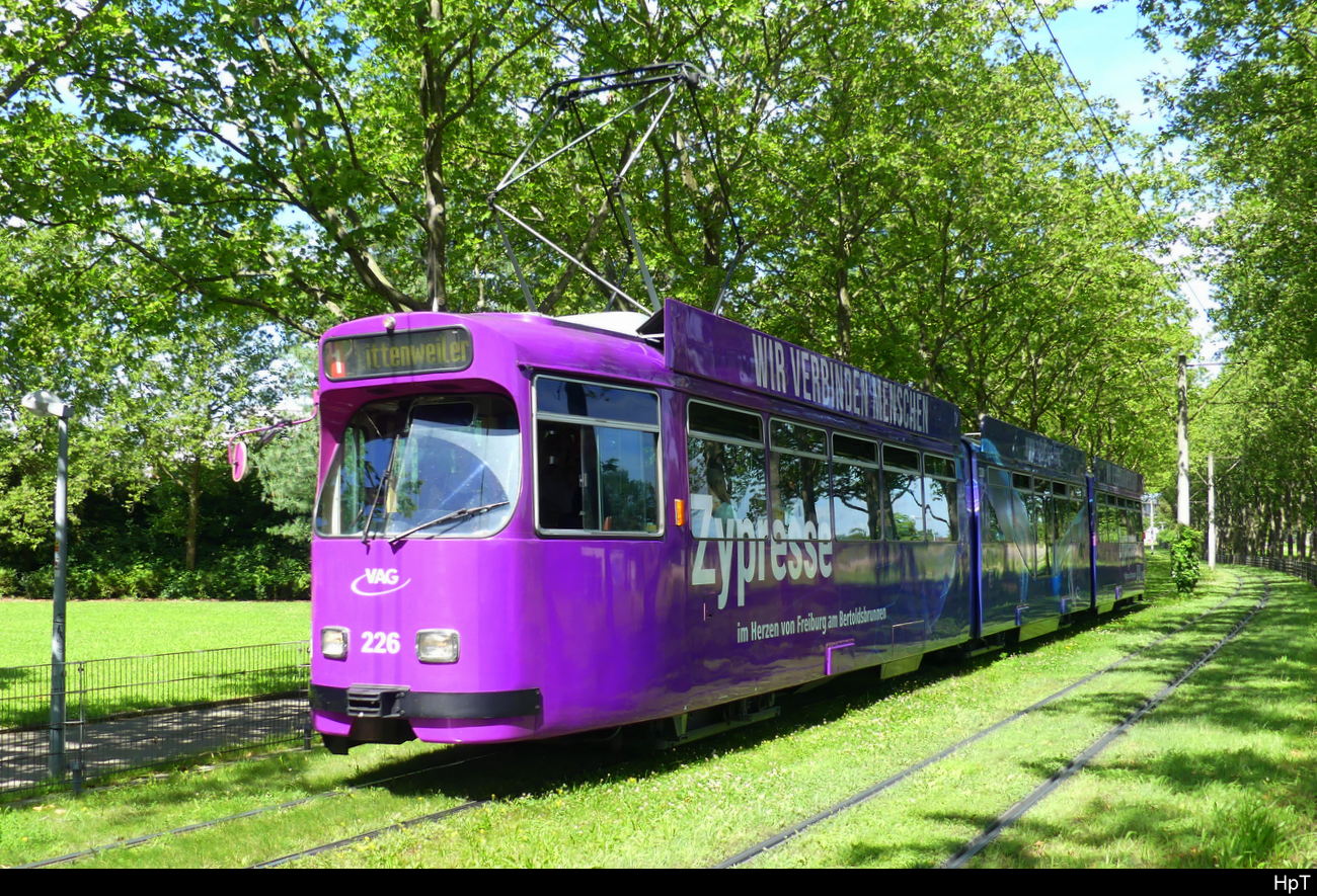 VAG Freiburg i.B. - Strassenbahn DUEWAG GT8N Nr.226 unterwegs auf der Linie 1 in der Stadt Freiburg am 2024.07.05