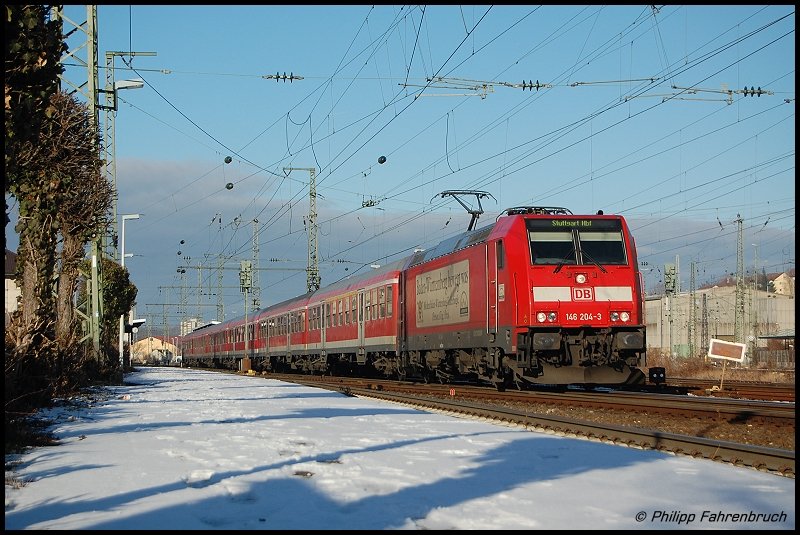 146 204-3 zog am 29.12.07 RE 19448 nach Stuttgart Hbf, aufgenommen bei der Ausfahrt aus dem Aalener Bahnhof.