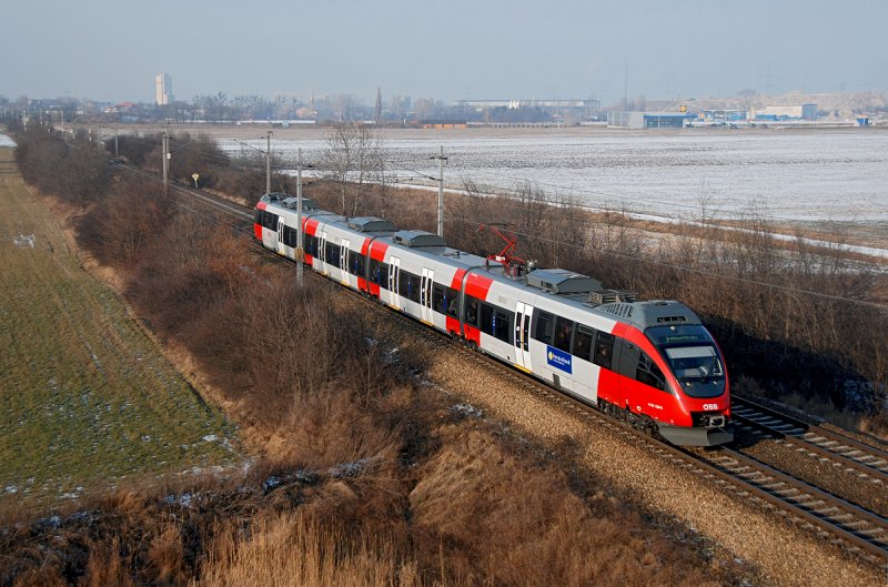 4024 als REX 7619 nach Bratislava Petrzalka, kurz nach Himberg am 17.01.2009.