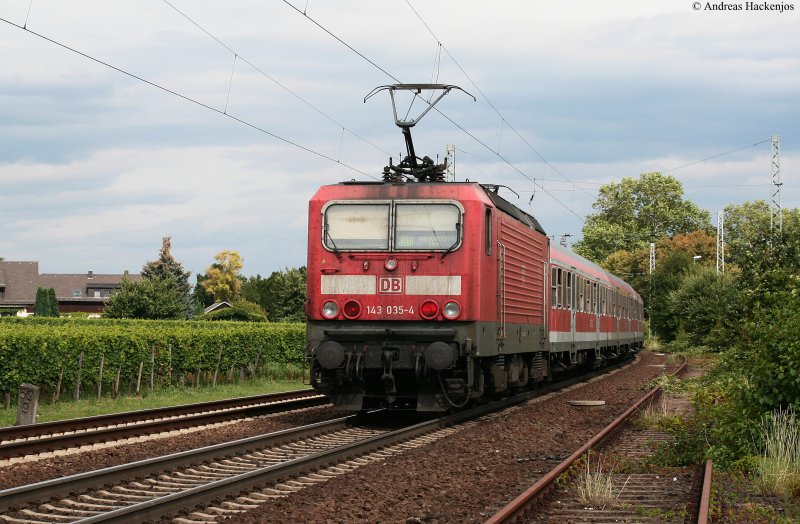 RB 15533 (Koblenz Hbf-Wiesbaden Hbf) mit Schublok 143 035-4  am km 59,9 12.8.09