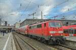 111 091 zieht den RB 6 aus dem Münchner Hbf nach Garmisch-Partenkirchen am 23.12.2024