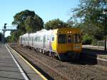 Eine Doppeleinheit der Class 3100 der Adelaide Metro mit Fahrtrichtung Belair am frhen Abend des 27.02.08 im Bahnhof Mitcham, SA. Der gesamte ffentliche Schienennahverkehr im Groraum Adelaide wird mit diesen Dieseltriebwagen bestritten.
