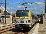Siemens Eurosprinter 1817 verlt am 19.07.2013 mit dem ICa 538 den Bahnhof Welkenraedt ber Brssel nach Ostende.