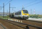 HLE 1330 + Gterzug 45901 nach Thionville. Ausfahrt der Rangierbahnhof Antwerpen-Noord am 29/07/2004