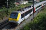 IC-Zug Eupen-Oostende verlsst den Bhf Welkenraedt (gezogen von der Elektrolok 1355). August 2009.