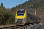 SNCB 08538, von Troisvierges kommend in Richtung Luxemburg unterwegs, aufgenommen am Fahrradweg, zwischen Maulusmühle und Clervaux. 14.01.2025