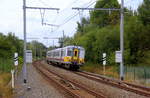 Ein Triebzug der SNCB 648 kommt aus Aachen-Hbf nach Spa-Géronstère(B) und kommt aus Richtung Aachen-Hbf,Aachen-Süd(D) und fährt in den Bahnhof von Hergenrath(B) ein und hält in Hergenrath(B) und fährt dann weiter in Richtung ,Astenet(B),Lontzen(B),Welkenraedt(B). Aufgenommen vom Bahnsteig 1 in Hergenrath(B). 
Bei Sonne und Wolken am Nachmittag vom 15.8.2018.