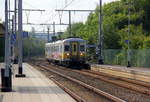 Ein Triebzug der SNCB 651 kommt aus Spa-Géronstère(B) nach Aachen-Hbf und kommt aus Richtung Welkenraedt(B),Lontzen(B),Astenet(B) und fährt den Bahnhof Hergenrath(B) ein und hält in Hergenrath(B) und fährt dann weiter in Richtung Aachen-Süd(D),Aachen-Hbf. 
Aufgenommen vom Bahnsteig 1 in Hergenrath(B). 
Bei Sommerwetter am Morgen vom 16.8.2018.
Und das ist mein 8900tes Bahnbild bei http://WWW.Bahnbilder de