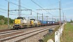 NMBS 7760 + 7750 mit einem langen Containerzug aus Athus zum Rangierbahnhof Stockem, bei der Ankunft in Stockem am 11.09.2009, 16.19u. Scanbild 17508, Fuji S200.