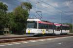  Kusttram  BN Nr.6025 fährt durch die Dünen bei Groenendijk.