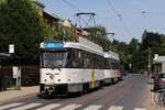 Tw.7153 + 7140 als Linie 4 nach Hoboken in der Haltestelle Cruyslei. (17.06.2022)