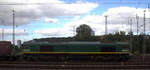 Die Class 66 266 024-9 von Railtraxx fährt mit viel Dieselpower mit einem Güterzug aus Köln-Eifeltor(D) nach Genk-Haven(B) bei der Ausfahrt aus Aachen-West in Richtung Montzen/Belgien.